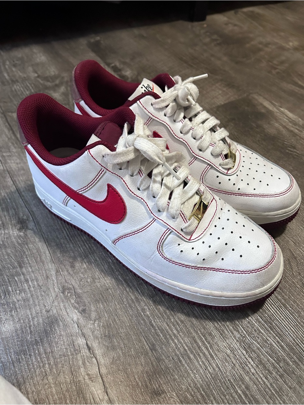 Nike Men’s White Sneakers with Red Accents